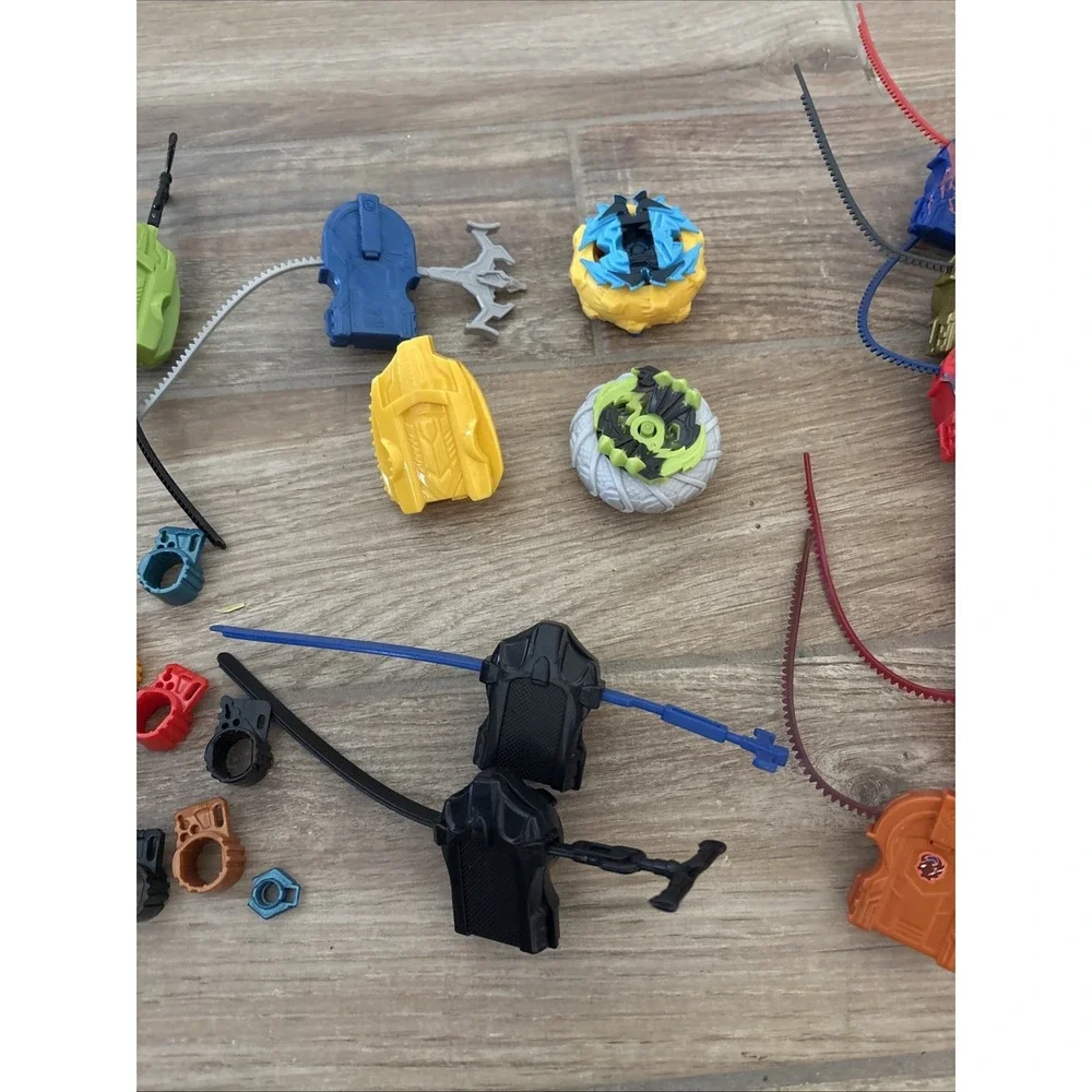 Vintage Hasbro Beyblade Lot Launchers & RIP Cords Various Sizes Colors 33 Pieces